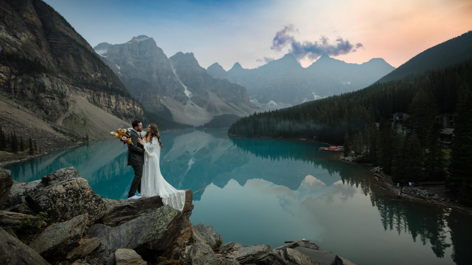 Wedding photo in the mountains, lake in background